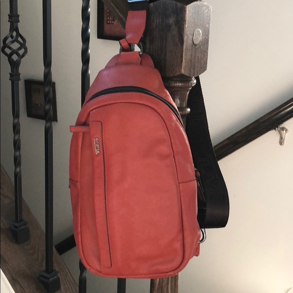 tumi leather sling bag